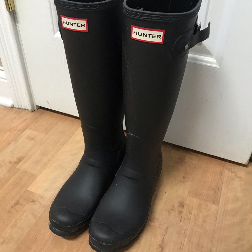 black tall hunter boots